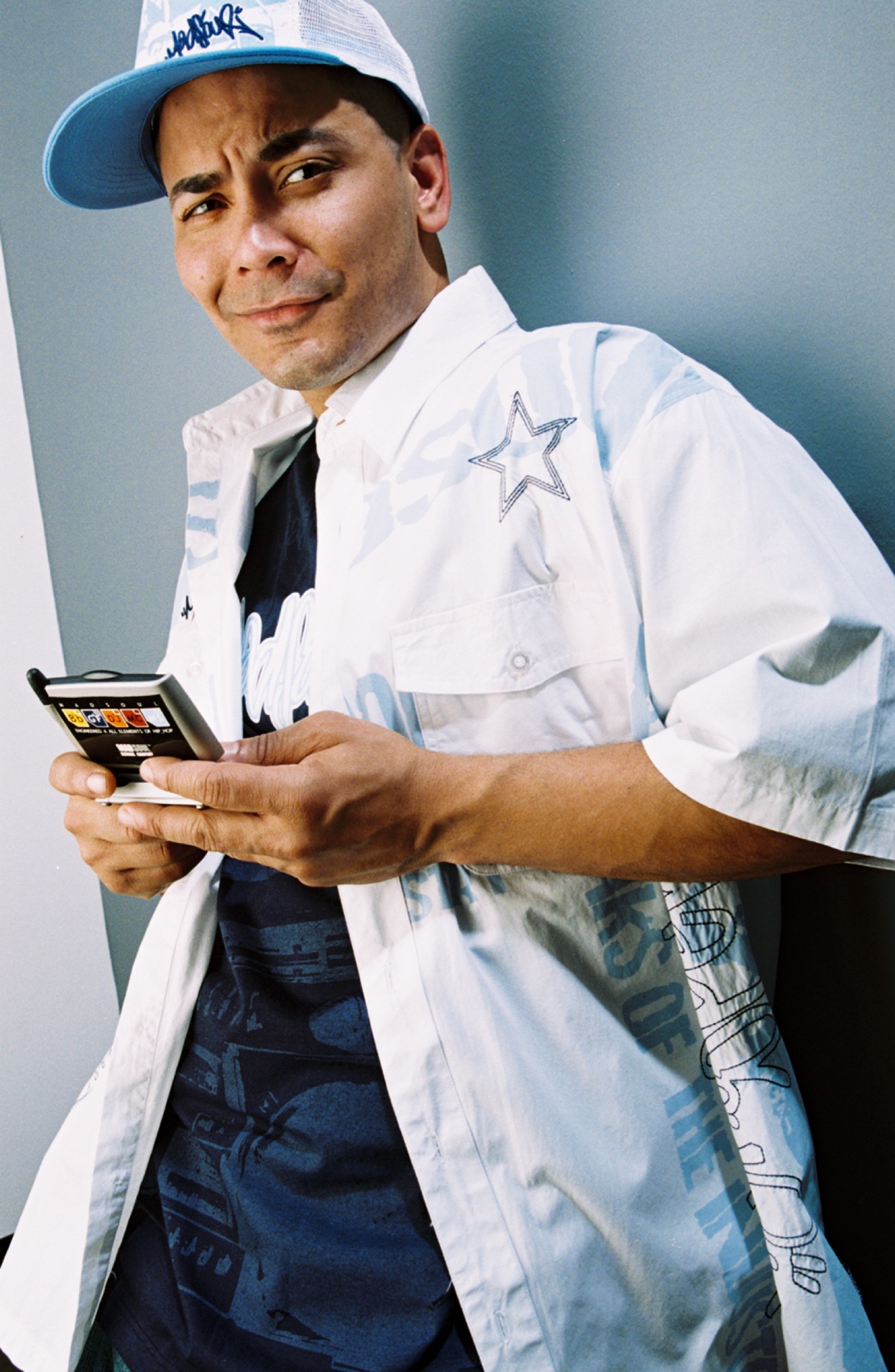 Model holding a Madsoul-branded phone accessory