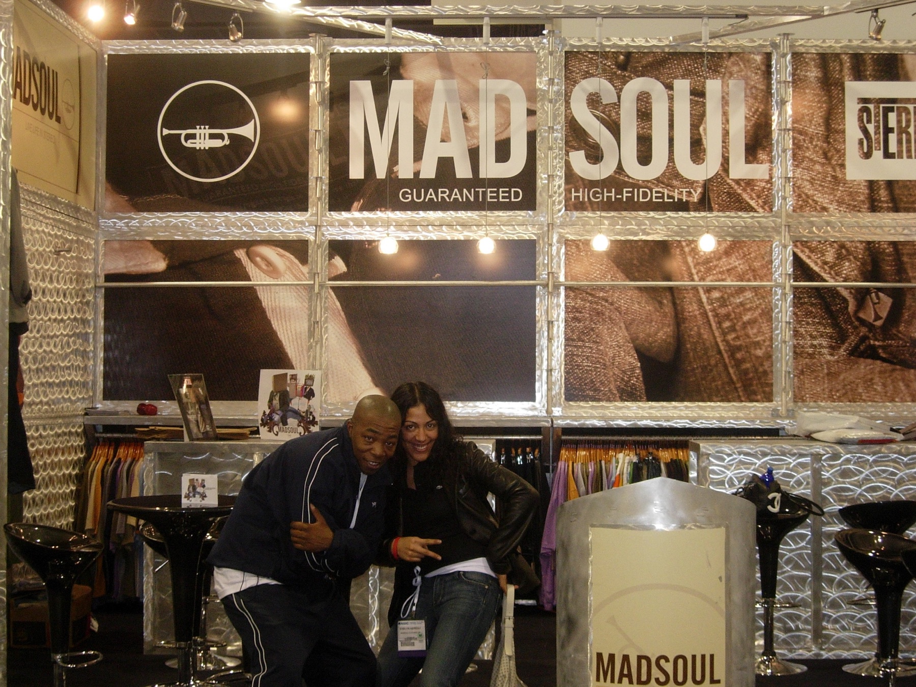 Buyers browsing the Madsoul booth on the MAGIC trade show floor