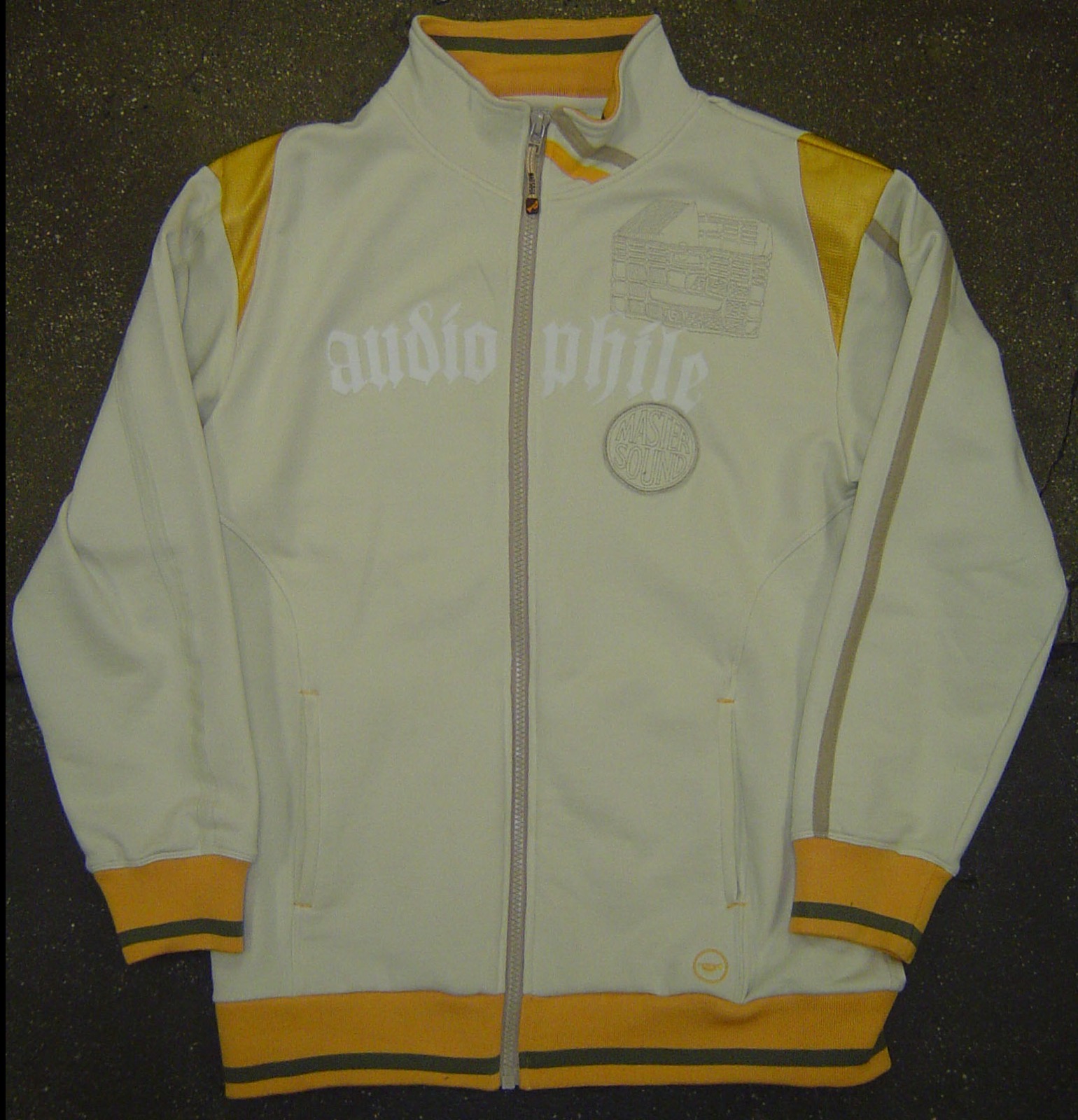 Audiophile track jacket in Avocado green, flat production photography