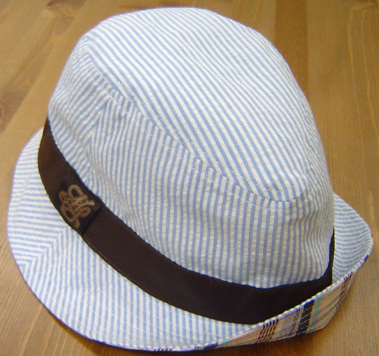 Madsoul seersucker bucket hat with embroidered script logo on the band