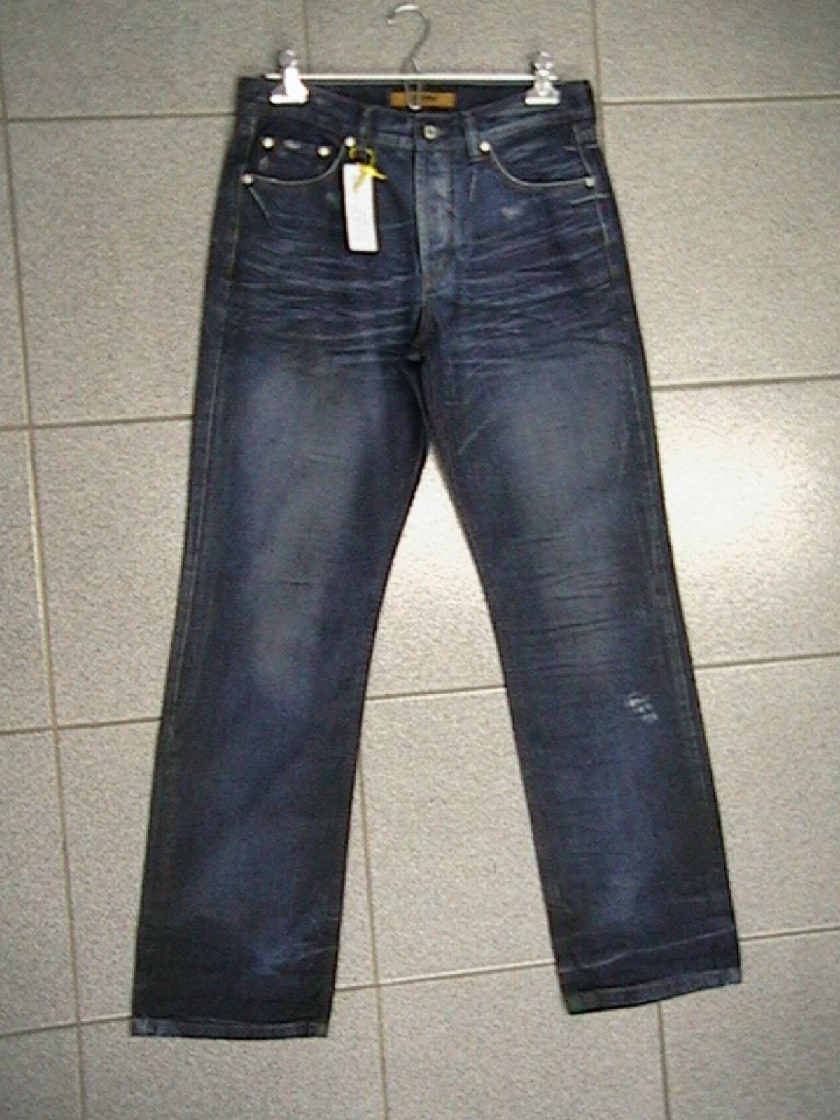 Madsoul denim jeans on a hanger with hangtag